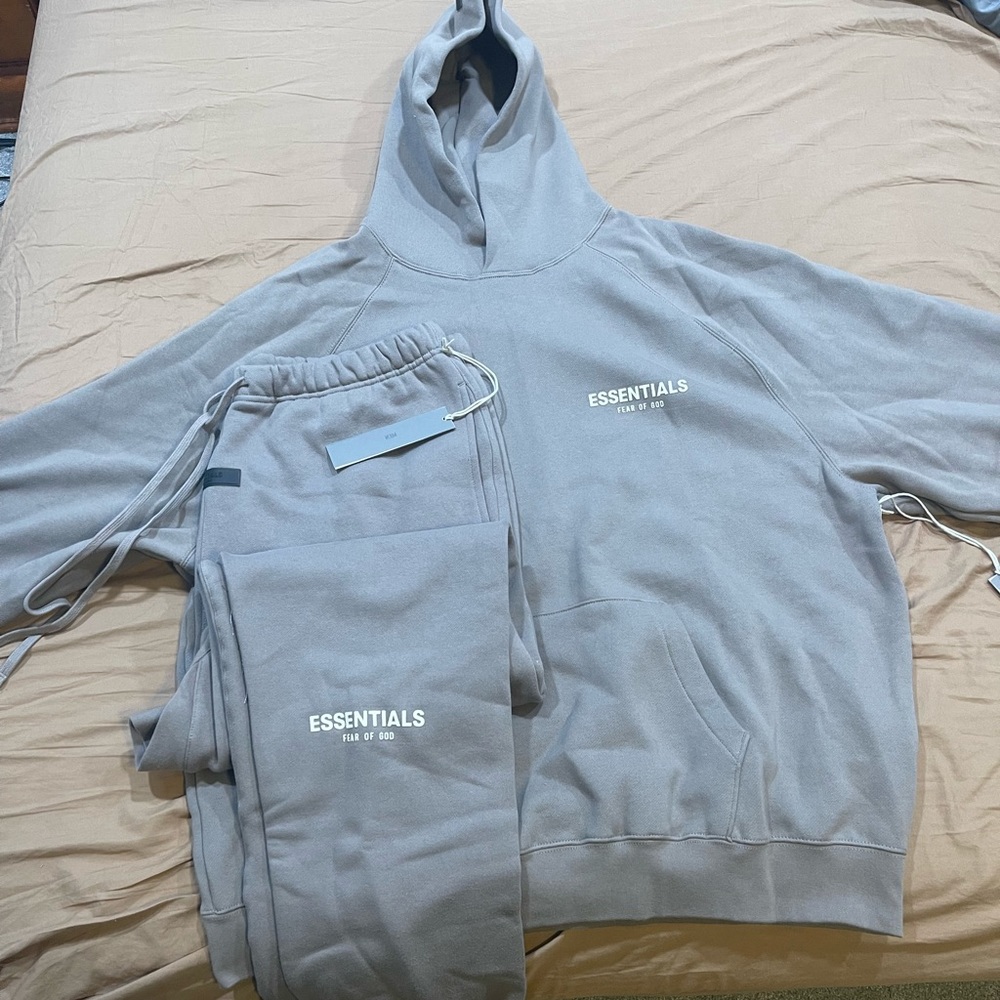 NEW ESSENTIALS! Never worn with tags! Has a decent oversized look to it.